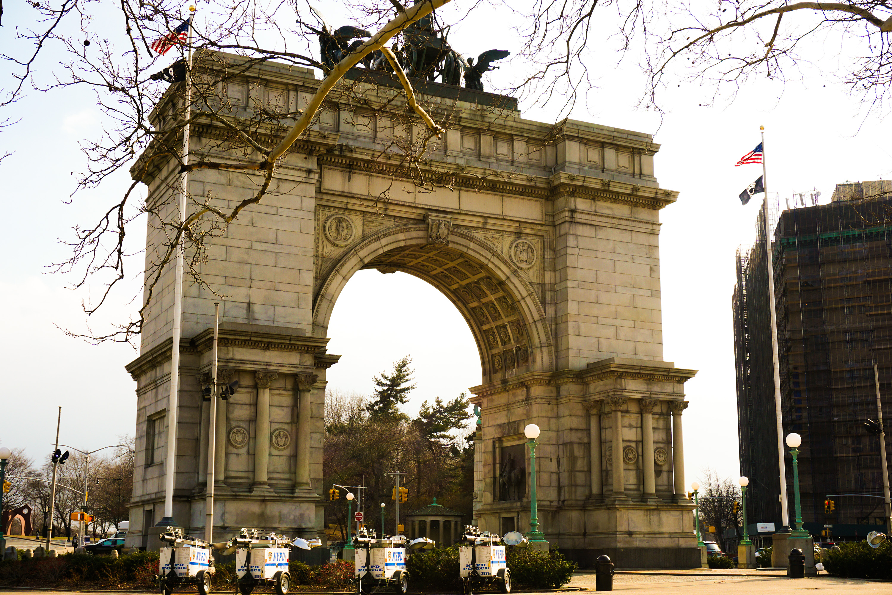 New York Arches with police cars in front of it