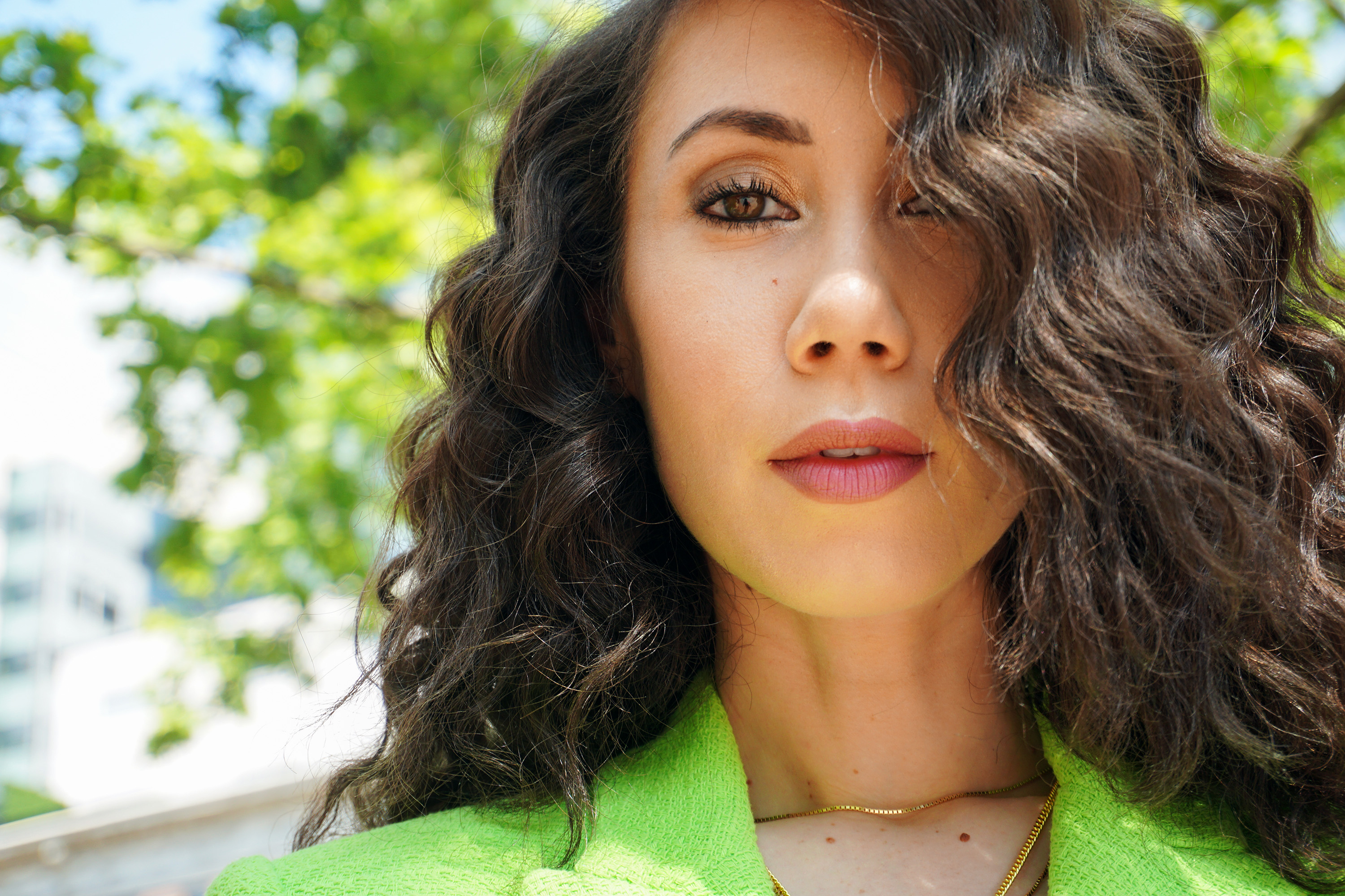 Close up of model Kelsey Butler with hair covering half of face